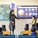 Students learning through smart boards and digital tools in a modern technology-enabled classroom in India