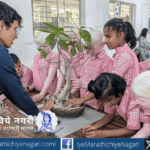 Visually impaired students exploring plants through touch and smell during National Science Day activity at Shivaji University Kolhapur.