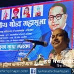Poet Ajay Kandar delivering speech on Ambedkar thoughts at Malvan event with audience